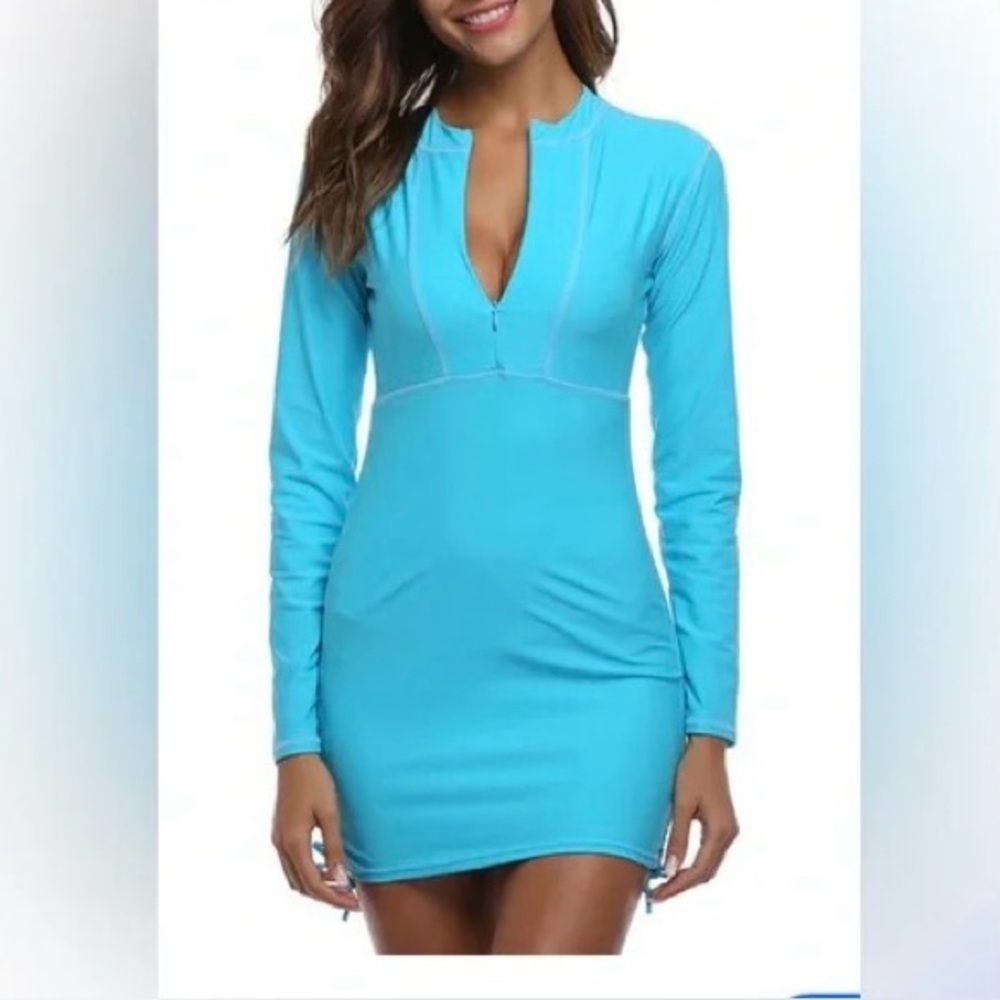 Athleta Women Turquoise Long Sleeve Swim Coverup 1/4 Zip
Small. NWOT